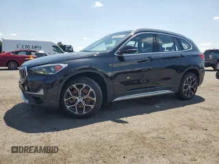 2021 BMW X1 xDrive28i with VIN WBXJG9C06M5S33201, listed as a Copart auction lot 66391015 with 53,395 mi miles and Salvage title. Bid and sale history available at DreamBid. Image 1.