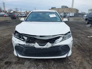 2020 Toyota Camry LE with VIN 4T1C11AK9LU912585, listed as a IAAI auction lot 41711816 with 142,751 mi miles. Bid and sale history available at carsss.com. Image 12.