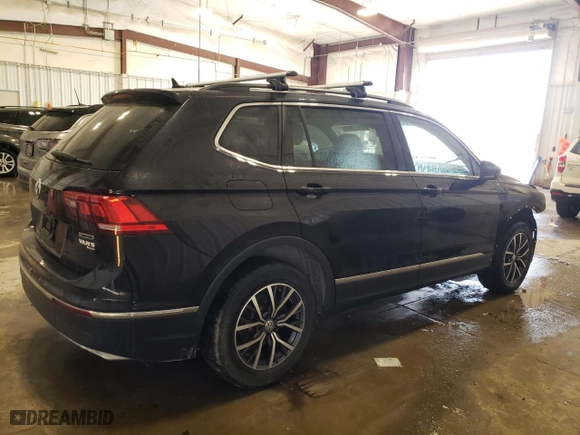 2020 Volkswagen Tiguan SE with VIN 3VV2B7AX2LM087281, listed as a Copart auction lot 41977395 with 106,122 mi miles and Salvage Title. Bid and sale history available at carsss.com. Image 3.