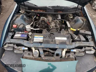 1997 Chevrolet Camaro z VIN 2G1FP22K2V2110191, wystawiony jako Copart lot #45376395 z przebiegiem Nie podano mil oraz Szkoda całkowita • Salvage title. Historia ofert i sprzedaży dostępna na DreamBid. Obrazek 11.