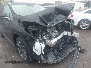 2022 Lexus RX with VIN 2T2HZMAA7NC256569, listed as a IAAI auction lot 41544198 with 17,605 mi miles. Bid and sale history available at carsss.com. Image 6.