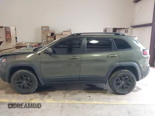 2020 Jeep Cherokee Trailhawk Elite with VIN 1C4PJMBN2LD538076, listed as a IAAI auction lot 42219282 with 53,773 mi miles and . Bid and sale history available at DreamBid. Image 14.
