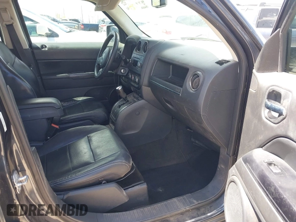 2014 Jeep Patriot Latitude with VIN 1C4NJPFA0ED848908, listed as a IAAI auction lot 41994006 with 131,122 mi miles and . Bid and sale history available at carsss.com. Image 5.