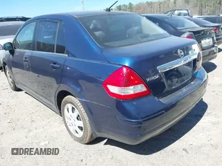 2009 Nissan Versa 1.8 S with VIN 3N1BC11E39L378963, listed as a IAAI auction lot 41829690 with 169,531 mi miles. Bid and sale history available at carsss.com. Image 3.