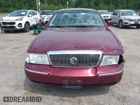 2005 Mercury Grand Marquis LS Premium z VIN 2MEHM75W05X636003, wystawiony jako IAAI lot #42480277 z przebiegiem 224 789 mil mil oraz . Historia ofert i sprzedaży dostępna na DreamBid. Obrazek 13.