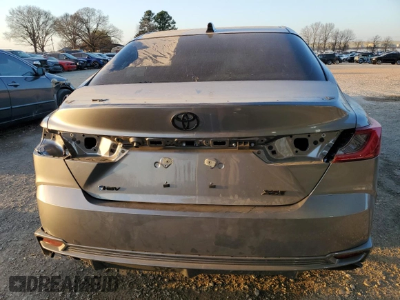 2025 Toyota Camry LE with VIN 4T1DAACK6SU510619, listed as a Copart auction lot 48764735 with 22,031 mi miles and Salvage Title. Bid and sale history available at DreamBid. Image 6.
