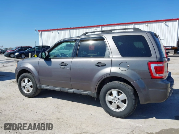 2011 Ford Escape XLT with VIN 1FMCU0D74BKA81385, listed as a IAAI auction lot 41895835 with 238,298 mi miles. Bid and sale history available at carsss.com. Image 14.