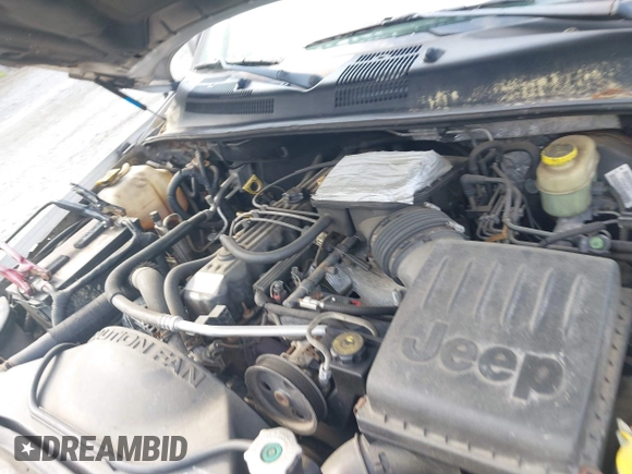 2004 Jeep Grand Cherokee Laredo z VIN 1J4GW48S54C106405, wystawiony jako IAAI lot #42315689 z przebiegiem 104 416 mil mil oraz . Historia ofert i sprzedaży dostępna na DreamBid. Obrazek 10.