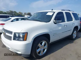 2013 Chevrolet Tahoe LTZ with VIN 1GNSKCE04DR374682, listed as a IAAI auction lot 42779526 with 139,533 mi miles and . Bid and sale history available at DreamBid. Image 2.