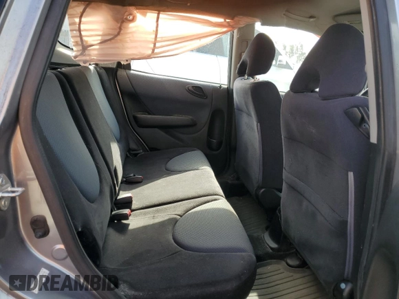 2007 Honda Fit z VIN JHMGD38447S026125, wystawiony jako Copart lot #56554145 z przebiegiem 227 284 mil mil oraz Szkoda całkowita • Salvage title. Historia ofert i sprzedaży dostępna na DreamBid. Obrazek 10.