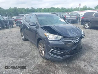 2017 Hyundai Santa Fe 2.4L with VIN 5XYZTDLB2HG451648, listed as a IAAI auction lot 42380301 with 156,687 mi miles and . Bid and sale history available at DreamBid. Image 1.