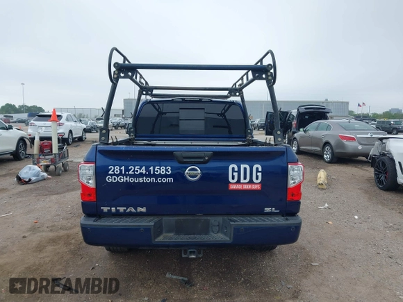 2018 Nissan Titan SV with VIN 1N6AA1E69JN500096, listed as a IAAI auction lot 41883390 with 136,752 mi miles and . Bid and sale history available at DreamBid. Image 17.