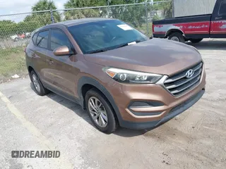 2016 Hyundai Tucson SE z VIN KM8J23A4XGU180300, wystawiony jako IAAI lot #42123067 z przebiegiem 123 804 mil mil oraz . Historia ofert i sprzedaży dostępna na DreamBid. Obrazek 1.