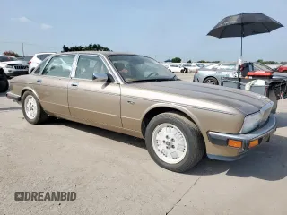 1994 Jaguar XJ с VIN SAJKX174XRC692378, выставлен на аукционе Copart как лот 65275795 с пробегом 80 748 миль миль и Чистый • Clean title. История ставок и продаж доступна на DreamBid. Изображение 4.