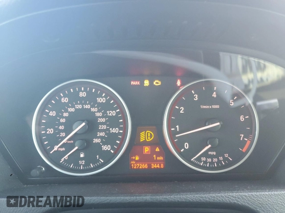 2011 BMW X5 35i with VIN 5UXZV4C57BL400693, listed as a Copart auction lot 46547685 with 127,266 mi miles and Salvage Title. Bid and sale history available at carsss.com. Image 9.
