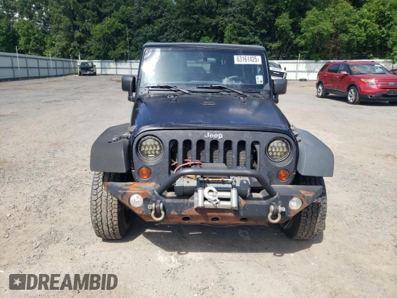 2012 Jeep Wrangler Sport z VIN 1C4AJWAG2CL245174, wystawiony jako Copart lot #63161425 z przebiegiem 136 626 mil mil oraz Czysty tytuł • Clean title. Historia ofert i sprzedaży dostępna na DreamBid. Obrazek 5.