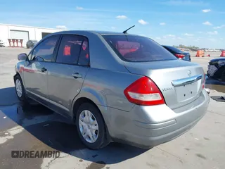 2010 Nissan Versa S with VIN 3N1BC1AP2AL394996, listed as a IAAI auction lot 40690760 with 125,972 mi miles and . Bid and sale history available at DreamBid. Image 3.