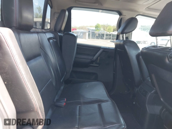 2012 Nissan Titan SV with VIN 1N6AA0EC0CN307743, listed as a IAAI auction lot 42085082 with 187,506 mi miles. Bid and sale history available at carsss.com. Image 8.