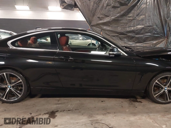2019 BMW 4 Series 430i with VIN WBA4W3C52KAF93592, listed as a IAAI auction lot 41119481 with 104,214 mi miles and . Bid and sale history available at DreamBid. Image 13.