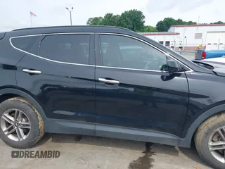 2017 Hyundai Santa Fe 2.4L with VIN 5NMZUDLB0HH037142, listed as a IAAI auction lot 42323880 with 87,396 mi miles and . Bid and sale history available at DreamBid. Image 12.