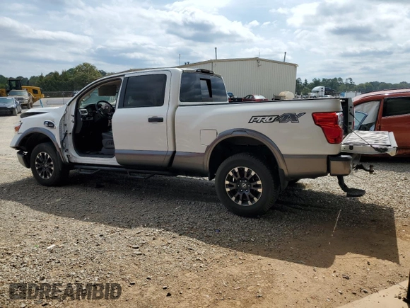 2018 Nissan Titan Platinum Reserve with VIN 1N6BA1F49JN521225, listed as a Copart auction lot 69831004 with 92,536 mi miles and Salvage title. Bid and sale history available at DreamBid. Image 2.