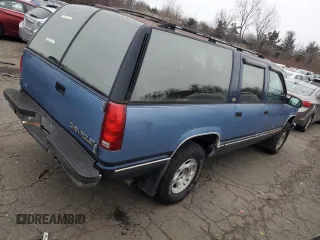 1994 Chevrolet Suburban z VIN 1GNFK16K4RJ348093, wystawiony jako Copart lot #87352784 z przebiegiem 118 442 mil mil oraz Nie do naprawy • Non repairable. Historia ofert i sprzedaży dostępna na DreamBid. Obrazek 3.