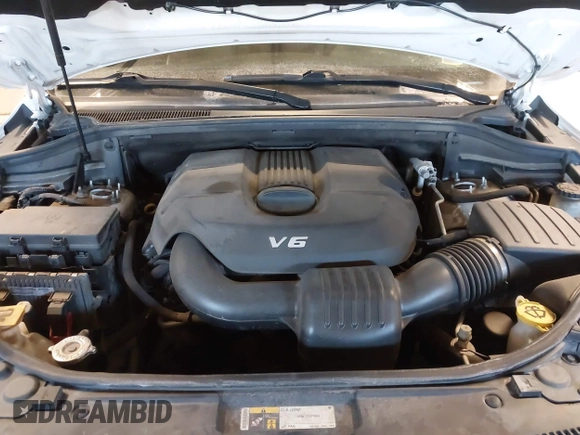 2015 Jeep Grand Cherokee Laredo with VIN 1C4RJFAG4FC660665, listed as a IAAI auction lot 41529532 with 124,099 mi miles. Bid and sale history available at carsss.com. Image 10.