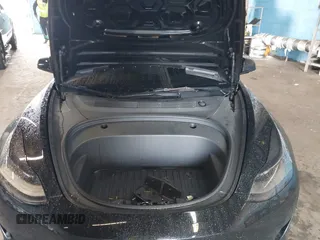 2023 Tesla Model 3 with VIN 5YJ3E1EA5PF396413, listed as a IAAI auction lot 42188639 with 57,717 mi miles and . Bid and sale history available at DreamBid. Image 10.
