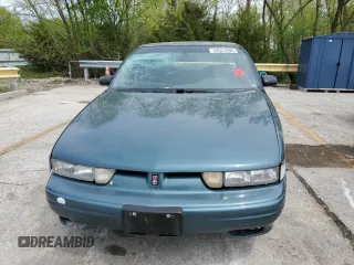 1997 Oldsmobile Cutlass Supreme S z VIN 1G3WH52MXVF317238, wystawiony jako Copart lot #53523905 z przebiegiem 135 925 mil mil oraz Szkody całkowita. Historia ofert i sprzedaży dostępna na DreamBid. Obrazek 5.
