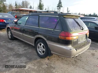 1999 Subaru Legacy Outback z VIN 4S3BG6856X7603852, wystawiony jako IAAI lot #41299373 z przebiegiem 168 991 mil mil oraz . Historia ofert i sprzedaży dostępna na DreamBid. Obrazek 3.