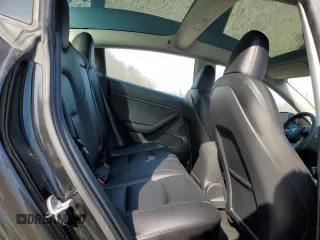 2023 Tesla Model 3 with VIN 5YJ3E1EA3PF670787, listed as a Copart auction lot 49070865 with 13,489 mi miles and Salvage title. Bid and sale history available at DreamBid. Image 10.