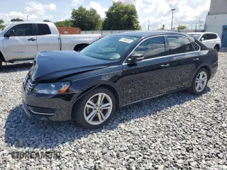 2014 Volkswagen Passat SE with VIN 1VWBN7A30EC106124, listed as a Copart auction lot 61066555 with 131,065 mi miles and Salvage title. Bid and sale history available at DreamBid. Image 1.