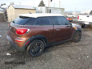2014 MINI Paceman z VIN WMWSS1C58EWN94368, wystawiony jako IAAI lot #41377194 z przebiegiem 56 897 mil mil oraz . Historia ofert i sprzedaży dostępna na DreamBid. Obrazek 4.