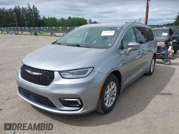2021 Chrysler Pacifica Touring L with VIN 2C4RC1BG3MR552828, listed as a IAAI auction lot 42207838 with 67,917 mi miles and . Bid and sale history available at DreamBid. Image 17.