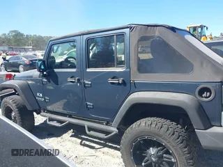 2008 Jeep Wrangler Unlimited X with VIN 1J4GB39138L589300, listed as a IAAI auction lot 41671690 with Not Provided miles and . Bid and sale history available at DreamBid. Image 14.