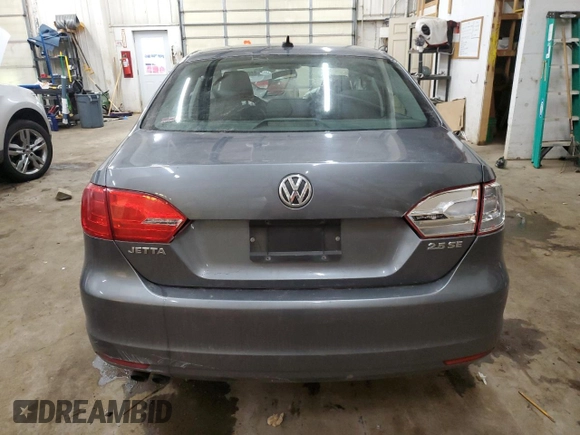 2013 Volkswagen Jetta SE with VIN 3VWDX7AJ2DM309725, listed as a Copart auction lot 86052114 with 70,828 mi miles and Salvage title. Bid and sale history available at DreamBid. Image 6.
