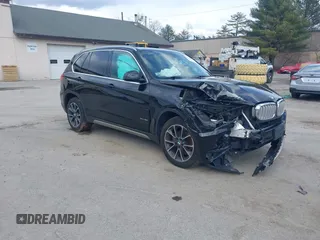 2017 BMW X5 xDrive35i with VIN 5UXKR0C36H0V77999, listed as a IAAI auction lot 41867766 with 98,222 mi miles. Bid and sale history available at carsss.com. Image 1.