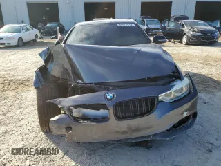 2015 BMW 4 Series 435i xDrive z VIN WBA3R5C56FK371987, wystawiony jako Copart lot #88077015 z przebiegiem Nie podano mil oraz Szkoda całkowita • Salvage title. Historia ofert i sprzedaży dostępna na DreamBid. Obrazek 5.