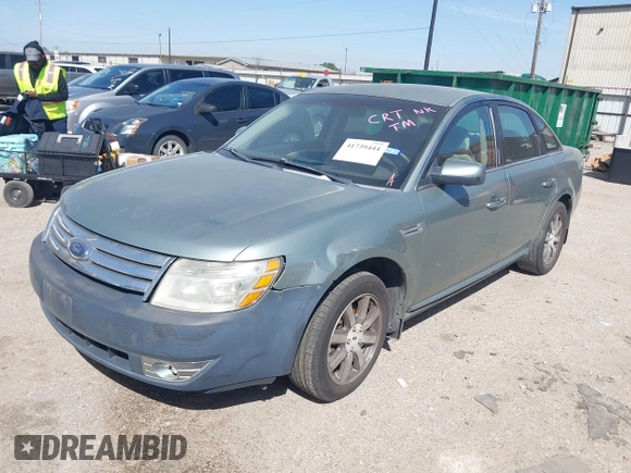 2008 Ford Taurus SEL with VIN 1FAHP27W38G109131, listed as a IAAI auction lot 41739444 with 147,848 mi miles. Bid and sale history available at carsss.com. Image 2.