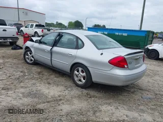 2003 Ford Taurus SE Standard with VIN 1FAHP53UX3G211556, listed as a IAAI auction lot 42208688 with 148,955 mi miles and . Bid and sale history available at DreamBid. Image 3.