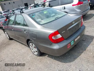 2002 Toyota Camry LE z VIN JTDBE32KX20070778, wystawiony jako IAAI lot #42389584 z przebiegiem 278 070 mil mil oraz . Historia ofert i sprzedaży dostępna na DreamBid. Obrazek 3.