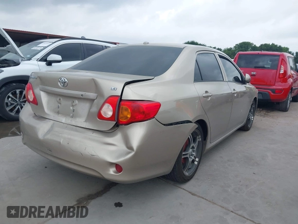 2009 Toyota Corolla with VIN 1NXBU40E99Z118081, listed as a IAAI auction lot 42086882 with 199,328 mi miles and . Bid and sale history available at DreamBid. Image 4.