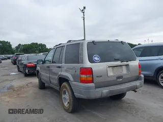 1998 Jeep Grand Cherokee Laredo with VIN 1J4FX58S6WC354101, listed as a IAAI auction lot 42158671 with 289,318 mi miles and . Bid and sale history available at DreamBid. Image 3.