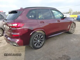 2021 BMW X5 M50i with VIN 5UXJU4C04M9G03418, listed as a IAAI auction lot 40705167 with 24,073 mi miles and . Bid and sale history available at DreamBid. Image 4.