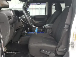 2014 Jeep Wrangler Unlimited Sport with VIN 1C4BJWDG1EL251390, listed as a Copart auction lot 48372535 with 86,611 mi miles and Salvage Title. Bid and sale history available at carsss.com. Image 7.