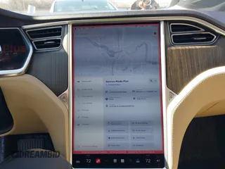 2013 Tesla Model S with VIN 5YJSA1CG2DFP14689, listed as a IAAI auction lot 41648508 with 98,578 mi miles and . Bid and sale history available at carsss.com. Image 17.