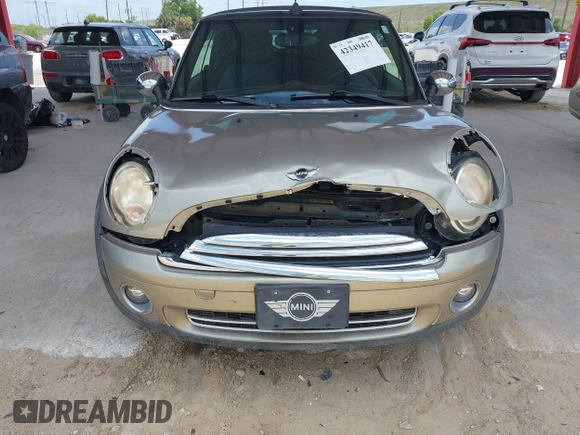 2010 MINI Convertible with VIN WMWMR3C52ATU97825, listed as a IAAI auction lot 42349417 with 64,045 mi miles and . Bid and sale history available at DreamBid. Image 6.