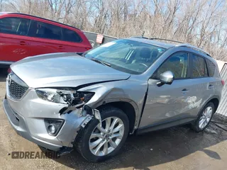 2014 Mazda CX-5 Grand Touring with VIN JM3KE2DY8E0375025, listed as a IAAI auction lot 41657755 with 103,601 mi miles. Bid and sale history available at carsss.com. Image 14.