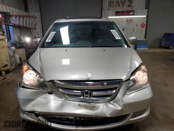 2007 Honda Odyssey Touring with VIN 5FNRL38847B013730, listed as a Copart auction lot 52028305 with 209,487 mi miles and Salvage Title. Bid and sale history available at carsss.com. Image 5.
