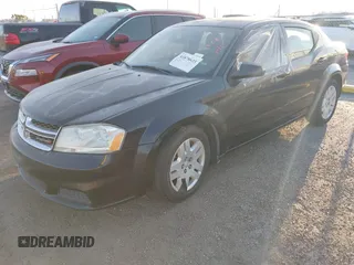 2014 Dodge Avenger SE with VIN 1C3CDZABXEN144000, listed as a IAAI auction lot 41878635 with 153,097 mi miles and . Bid and sale history available at DreamBid. Image 2.